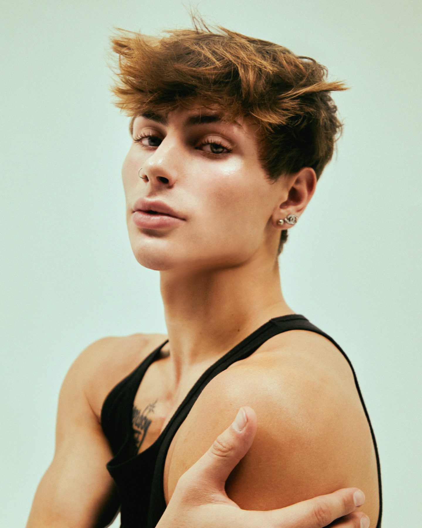 Kobe Marsh editorial headshot, over shoulder